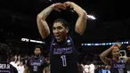 Pebasket Indonesia, Derrick Michael merayakan kemenangan timnya, Grand Canyon Antelopes setelah mengalahkan Saint Mary pada putaran pertama Divisi I NCAA yang berlangsung di Spokane Veterans Memorial Arena, Washington, Amerika, Minggu (23/03/2024) WIB. (AFP/Getty Images/Steph Chambers)