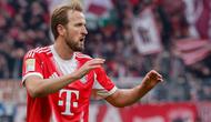 Penyerang Bayern Munich asal Inggris bernomor punggung 09, Harry Kane, merayakan gol yang membuat skor menjadi 0-2 dalam pertandingan Bundesliga divisi pertama Jerman antara SV Werder Bremen dan FC Bayern Munich di Bremen, Jerman utara, 14 Februari 2026. (Focke Strangmann/AFP)