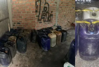 Barang bukti penimbunan BBM jenis solar dan pertalite dibongkar polisi di Pringsewu, Lampung. (Liputan6.com/Ardi Munthe)
