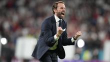 Gareth Southgate. Pelatih berusia 51 tahun yang masih menjabat sebagai pelatih Timnas Inggris ini sukses membawa Three Lions menjadi runner-up di ajang Euro 2020 lalu. Sebelumnya, ia pernah membesut Middlesbrough pada 2006 hingga 2009 dan Inggris U-21 pada 2013 hingga 2016. (AFP/Pool/Frank Augstein)