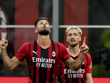 AC Milan berhasil menang telak atas tamunya Cagliari pada pekan kedua Liga Italia musim 2021/2022. Dua gol kemenangan Rossoneri dicetak oleh rekrutan anyar mereka pada musim ini, Olivier Giroud. (Foto: AP/Luca Bruno)