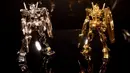 Tanaka Kikinzoku Jewelry Jepang menampilkan sebuah robot Gundam yang terbuat dari emas murni di acara pameran "The Art of Gundam" di Tokyo, 17 Juli 2015.  Replika robot berukuran 12,5 cm ini dibanderol dengan harga Rp2 Miliar. (AFP PHOTO/Yoshikazu Tsuno)