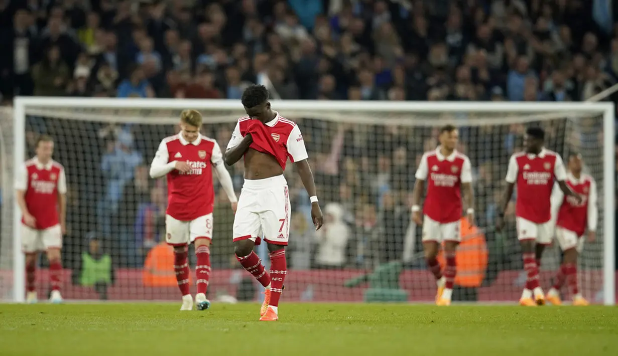 <p>Arsenal sendiri meski kalah telah memastikan tiket berlaga ke kompetisi Liga Champions musim depan. (AP Photo/Dave Thompson)</p>