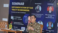 Seminar penerapan tax treaty di Indonesia di di Universitas Kristen Indonesia (UKI), Jumat (15/12/2023).