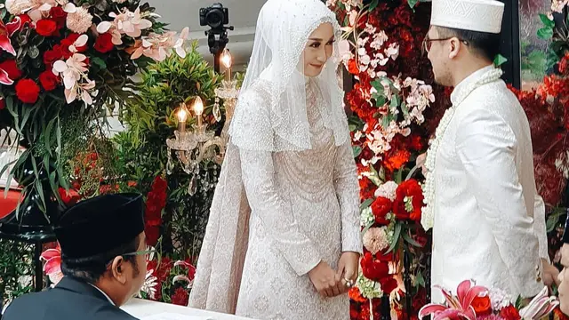 [Fimela] Dian Pelangi dan Sandy Nasution