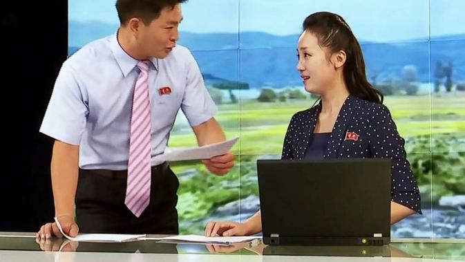 Presenter televisi negara Korea Utara (KCTV) (kredit: KCTV)