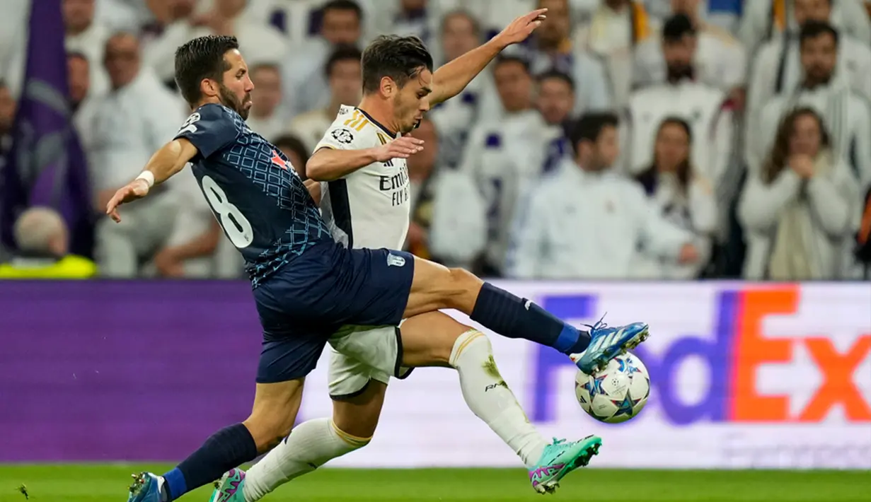 Bermain di kandang, Real Madrid baru dapat mencetak gol pada menit ke-27. (AP Photo/Jose Breton)