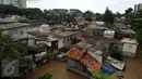 Kondisi pemukiman warga yang terkena banir di kawasan Rawajati, Jakarta, Selasa (8/3/2016). Akibat banjir kiriman dari Bogor, ratusan rumah di kawasan Rawajati Kalibata terendam hingga kedalaman 120cm. (Liputan6.com/Helmi Fithriansyah)