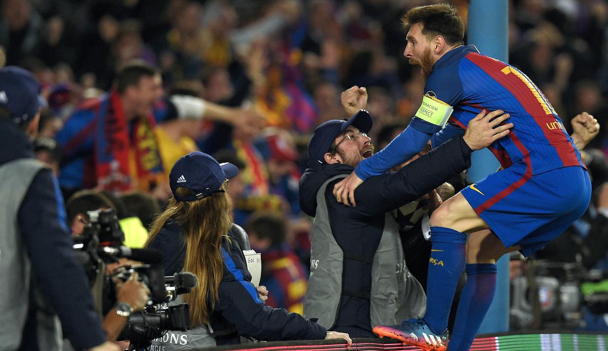 1. Lionel Messi (Barcelona) - 11 Gol. (AFP/Lluis Gene)