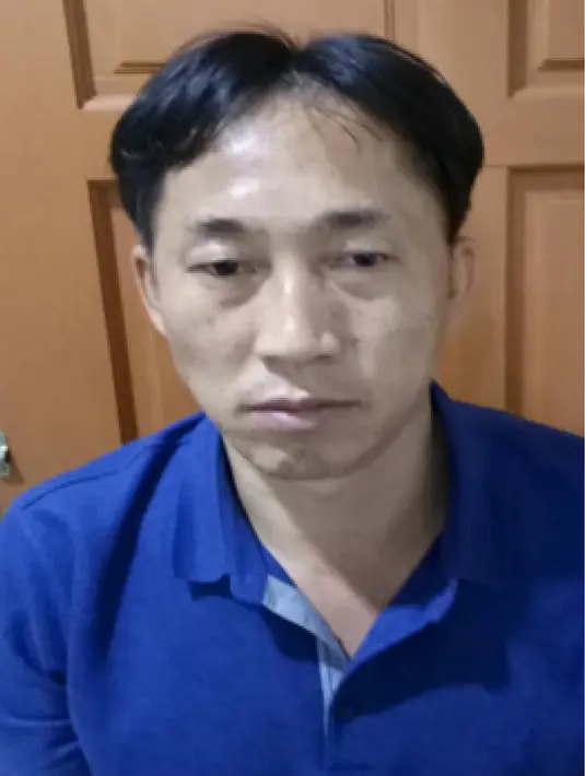 Foto yang dirilis Polisi Kerajaan Malaysia menunjukkan Warga Negara Korea Utara, Ri Jong Chol pada 19 Februari 2017. Polisi Malaysia juga masih memburu sejumlah orang yang diduga membunuh Kim Jong Nam. (Handout / Royal Malaysian Police / AFP)