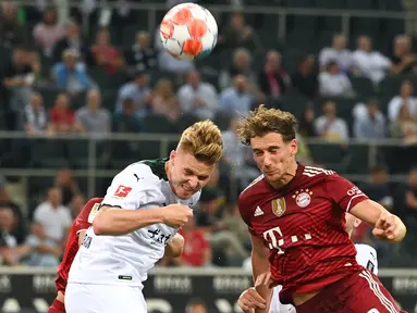 Bayern Muncih gagal berikan kemenangan di laga pembuka Liga Jerman usai ditahan imbang oleh Moenchengladbach. Tuan rumah mampu merepotkan juara bertahan Liga Jerman musim 2020/2021. (Foto: AFP/Ina Fassbender)