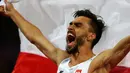 Pelari asal Polandia, Adam Kszczot mengekspresikan perasaannya setelah memenangi medali perak pada final 400 meter di Kejuaraan Dunia Atletik 2017 yang berlangsung di London, Inggris, 8 Agustus 2017. (AP Photo/Frank Augstein)
