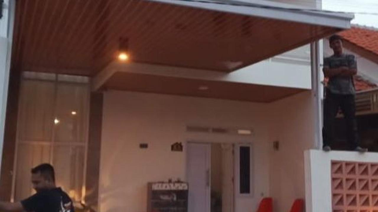 Desain Rumah Tanpa Pagar dengan Garasi Luas