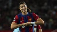 Tiga gol lainnya masing-masing diciptakan oleh Robert Lewandowski, bunuh diri Jelle Bataille, dan Gavi. (LLUIS GENE / AFP)