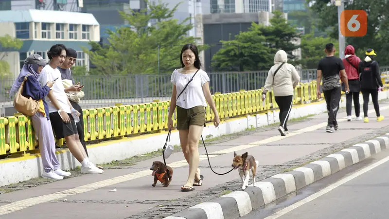 Foto: Ragam Cara Warga Menikmati Car Free Day di Jakarta