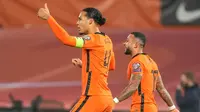 Virgil van Dijk memimpin Timnas Belanda meraih kemenangan 2-0 atas Norwegia pada laga terakhir Grup G kualifikasi Piala Dunia 2022, Rabu (17/11/2021) dini hari WIB. (AP Photo/Peter Dejong)