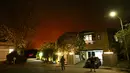 Otoritas setempat telah mengeluarkan perintah evakuasi untuk mencegah bertambahnya korban dalam Kebakaran Palisades. (Patrick T. Fallon/AFP)