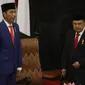 Presiden Joko Widodo didampingi Wakil Presiden Jusuf Kalla menghadiri sidang Tahunan MPR Tahun 2019 di Kompleks Parlemen, Senayan, Jakarta, Jumat (16/7/2019). Sidang tersebut beragendakan penyampaian pidato kenegaraan Presiden dalam rangka HUT Ke-74 Republik Indonesia. (Liputan6.com/Johan Tallo)