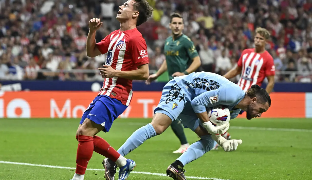 Namun, Atletico Madrid melakukan comeback berkat gol-gol Nahuel Molina  dan dwigol Angel Correa. (JAVIER SORIANO / AFP)