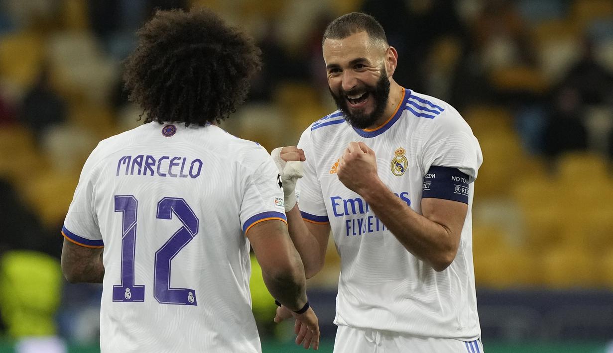 Dua gol Real Madrid diciptakan oleh Rodrygo dan Karim Benzema pada menit ke-64 dan menit injury time babak kedua. Hasil tersebut membuat Real Madrid menempati posisi kedua sedangkan Shakhtar Donetsk terbenam di dasar klasemen Grup D. (AFP/Efrem Lukatsky)