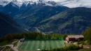 Suasana Stadion Ottmar Hitzfeld di tengah pegunungan Alpen Swiss (14/5/2020). Markas klub FC Gspon tersebut berada  pada ketinggian 2.000 meter di atas permukaan laut. (AFP/Fabrice Coffrini)