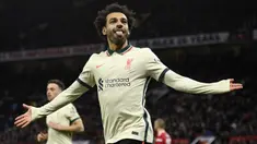 Luar biasa Mohamed Salah! Tiga golnya bagi Liverpool ke gawang Manchester United di Old Trafford, Minggu (24/10/2021) menjadi pukulan telak bagi Setan Merah dan tentunya pembuktian untuk sang rival, Cristiano Ronaldo yang telah kenyang dengan berbagai rekor. (AFP/Oli Scarff)
