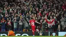 Pemain Liverpool, Diogo Jota merayakan gol di depan pendukung timnya pada laga Grup E Liga Europa 2023/2024 melawan Union Saint-Gilloise yang berlangsung di Anfield, Inggris, Jumat (6/10/2023) dini hari WIB. (AP Photo/Jon Super)