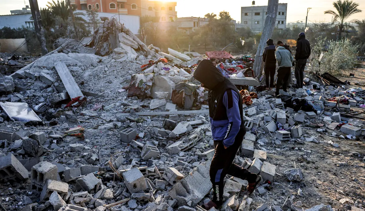 Memasuki tahun kedua, kecaman internasional terhadap serangan militer Israel di Gaza semakin membesar. (BASHAR TALEB/AFP)