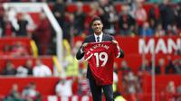 Manajer Manchester United, Ole Gunnar Solskjaer, menyambut antusias kedatangan Raphael Varane sebagai rekrutan anyar pada musim panas ini. (AFP/Adrian Dennis)