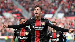 Gelandang Leverkusen, Kai Havertz, saat merayakan golnya ke gawang RB Leipzig dalam laga lanjutan kompetisi Bundesliga di Leverkusen, Jerman pada 6 April 2019. Bayer Leverkusen menang 2-1 atas Leipzig. (AFP/Hasan Bratic)