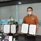 Penandatangan kerja sama KKP dengan kalikan.id untuk memperkuat jangkauan pasar ikan hias air tawar Indonesia.(Foto: Liputan6.com/KKP)