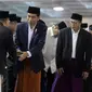 Presiden Joko Widodo (Jokowi) tiba untuk melaksanakan Salat Idul Fitri di Masjid Istiqlal, Jakarta, Minggu (25/6). Pemerintah menetapkan 1Syawal 1438 H pada Minggu (25/6) setelah menunaikan 29 hari ibadah puasa. (Liputan6.com/Johan Tallo)