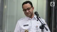 Gubernur DKI Jakarta Anies Baswedan memberikan keterangan seusai menjalani pemeriksaan di Gedung KPK, Jakarta, Rabu (7/9/2022). Anies Baswedan diperiksa KPK terkait dugaan korupsi di penyelenggaraan Formula E Jakarta. (Liputan6.com/Faizal Fanani)