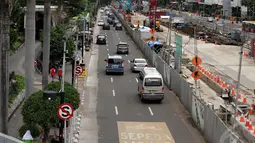 Suasana jalanan Jakarta di hari libur nasional tahun baru 2015, Kamis (1/1/2015). (Liputan6.com/Faizal Fanani)