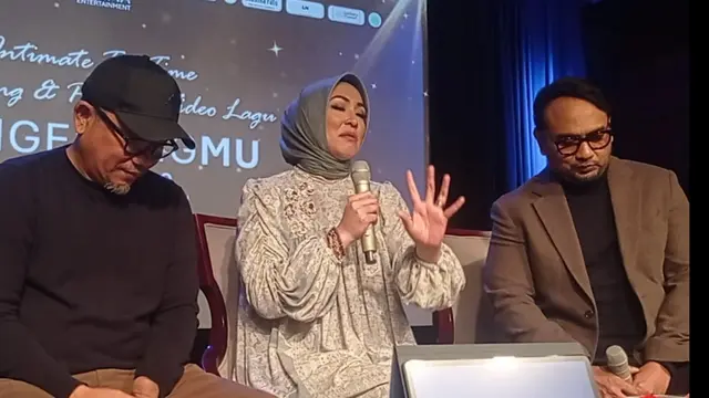Angelina Sondakh mengenang mantan suaminya, Adjie Massaid, lewat sebuah karya musik.