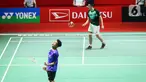 Pebulu tangkis tunggal putra Indonesia Christian Adinata (kiri) melakukan selebrasi usai mengalahkan pebulu tangkis tunggal putra Belanda Mark Caljouw pada babak kualifikasi turnamen Daihatsu Indonesia Masters 2023 di Istora Gelora Bung Karno, Jakarta, Selasa (24/1/2023). Christian Adinata menang atas Mark Caljouw dengan skor 20-22, 21-14, dan 21-17. (Liputan6.com/Herman Zakharia)