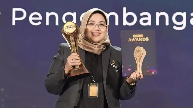 Direktur Utama Pegadaian Raih Penghargaan Tokoh Pendukung Inklusivitas Keuangan