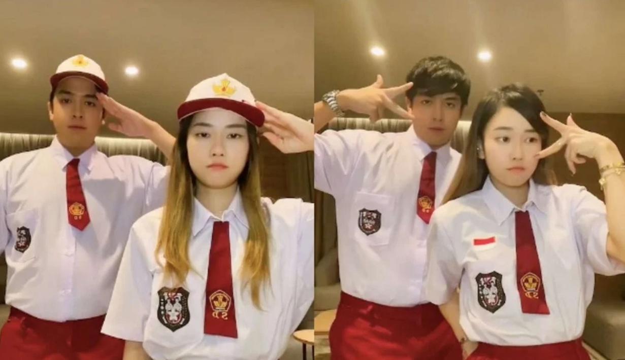 Jerome Polin terkenal dengan aksi-aksi lucunya saat membuat konten. Kelucuan tersebut terlihat saat bersama dengan Jessica Jane. Keduanya kompak pakai seragam SD. Tak hanya itu, dance keduanya pun mengundang gelak tawa. (Liputan6.com/IG/jeromepolin)