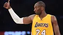 Ekspresi Kobe Bryant saat pertandingan LA Lakers melawan Miami Heat dalam laga basket NBA di Staples Center, Los Angeles, California, AS, (13/1/2015). (AFP/Robyn Beck)