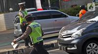 Awal pekan, Senin (26/8/2024) aturan ganjil genap Jakarta kembali berlaku. (Liputan6.com/Herman Zakharia)