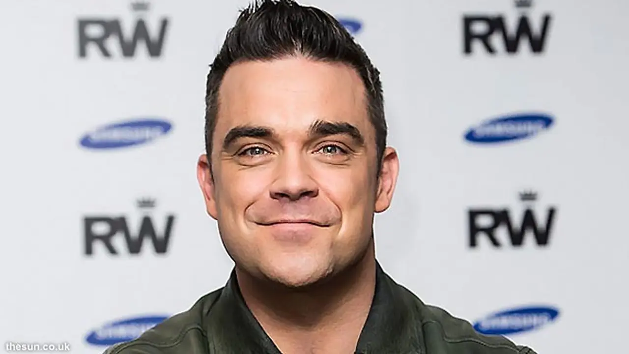 Robbie Williams Reuni dengan Take That