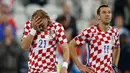 Ekspresi pemain Kroasia usai dikalahkan Portugal 2-1 di babak 16 besar piala Eropa 2016 di  Stade Bollaert, Lens , Prancis, (26/6). (REUTERS / Gonzalo Fuentes)