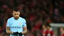 Ekspresi pemain Manchester City Nicolas Otamendi usai dikalahkan Liverpool dalam pertandingan Liga Champions di Anfield, Liverpool (4/4). Liverpool menang 3-0 atas Manchester City. (AFP Photo/Dave Thompson)