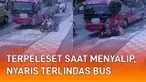 Seorang pemotor perempuan nyaris terlindas bus saat menyalip mengundang perhatian.