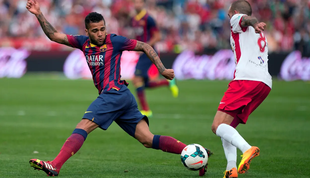 Dani Alves bergabung dengan Barcelona tahun 2008 dari Sevilla dan telah meraih 5 gelar La Liga dan 3 trofi Liga Champions bersama Barca. (AFP/Jorge Guerrero)