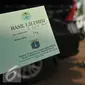 Kertas hasil uji emisi kendaraan diperlihatkan di pintu satu Gelora Bung Karno, Jakarta, Selasa (17/5). Pemkot Administrasi Jakpus melakukan uji emisi kendaraan selama tiga hari untuk mengevaluasi kualitas udara perkotaan. (Liputan6.com/Gempur M Surya)