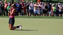 Ekspresi Michelle Wie setelah bola yang dipukulnya meleset dalam babak ketiga Turnamen Golf Wanita AS Terbuka di Lancaster Country Club, AS. (11/7/2015). (AP Photo/Frank Franklin II)