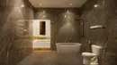 Di kamar mandi juga terasa mewah dengan perabot-perabot kualitas atas. Terdapat bathtub dan lighting yang apik menerangi ruangan. [Instagram @angellelga]