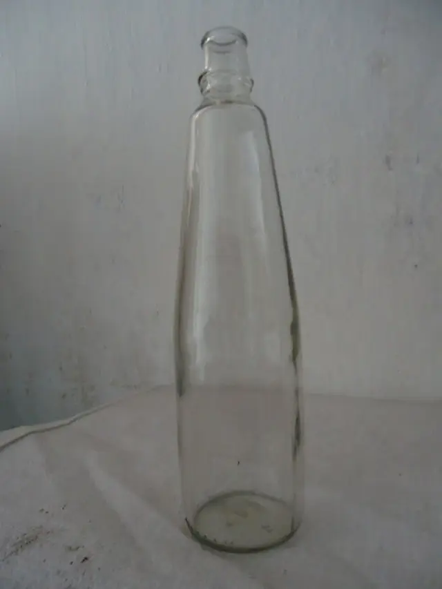 cara tajamkan gunting tumpul dengan botol (foto: Ucnews.com/ Dream.co.id)
