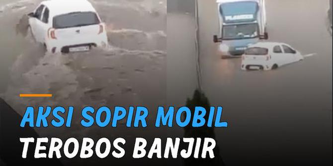VIDEO: Aksi Jago Sopir Mobil Terobos Banjir dan Hindari Tabrakan dengan Truk